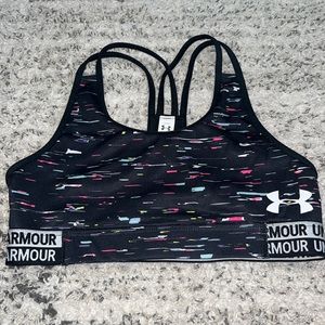 this is a speckled under armour sports bra in good condition! it’s multicolored!